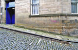 Metal Gutter and Drain at the edge of Calton Hill, the steep street leading up from Leith Street to Regent Road