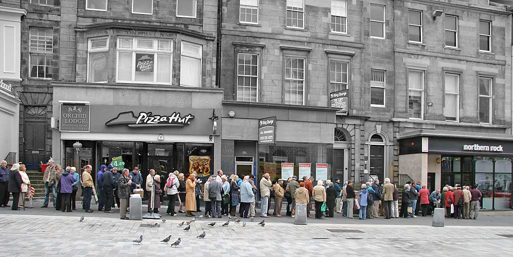 Investors queue outside the Castle Street office of Northern Rock  -  September 2007