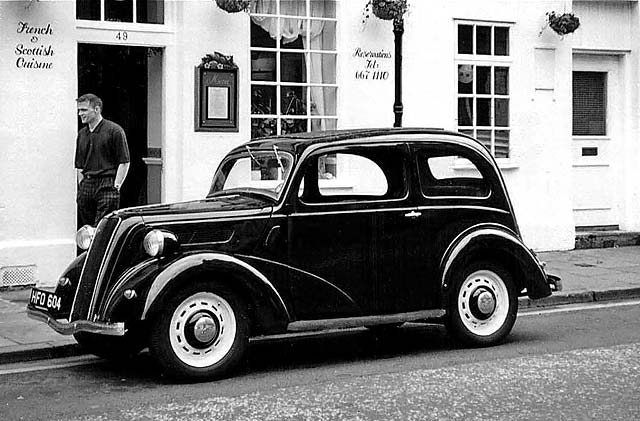 Old car parked outside restaurant at 49 Causewayside