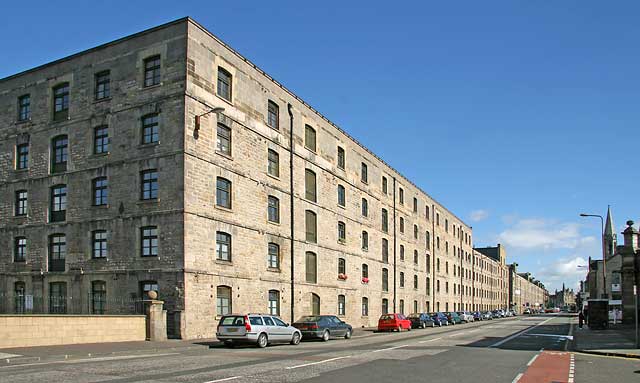 Commercial Street, Leith  -  View to the east towards Berard Street.  Old bonded warehouses, now converted into apartments  in the foreground