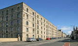 Commercial Street, Leith  -  View to the east towards Berard Street.  Old bonded warehouses, now converted into apartments  in the foreground