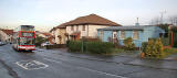 Looking north down Craigour Avenue, including some prefab housing