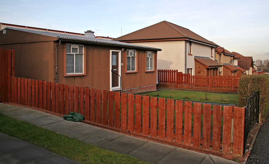 Looking south up Craigour Avenue, including one of the prefab bungalows that has survived in the area
