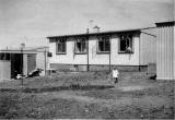 John + Joan Morton at their prefab at 5 Craigour Avenue  -  Photo taken in 1950