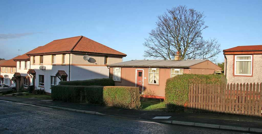 Looking to the NW down Craigour drive, with prefab bungalows built in the 1940s