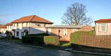 Looking to the NW down Craigour drive, with prefab bungalows built in the 1940s