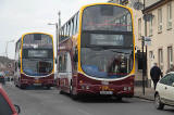 Looknig NW down Drum Street towards the centre of Gilmerton - 2011  -  Two buses