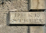 Duke Street sign, carved into the stonework of one of the buildings at the top of Dublin Street