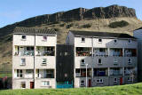 Looking to the east to the backs of the homes in Dumbiedykes Road, and beyond to Salisbury Crags in Holyrood Park