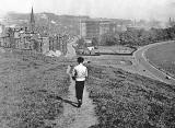 Looking down on Dumbiedykes from a path through Holyrood Park leading from James Clark's School