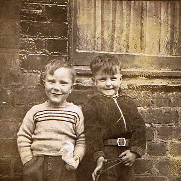 Rab Blackwood and Brian Gilhooley at 41 Dumbiedykes Road around 1955