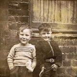 Kenny Blackwood and Brian Gilhooley at 41 Dumbiedykes Road around 1955