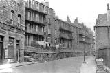 Dumbiedykes Road  -  no traffic, just a pram.