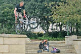 Cyclist, performing on one of the walls around Bristo Square  -  September 2007