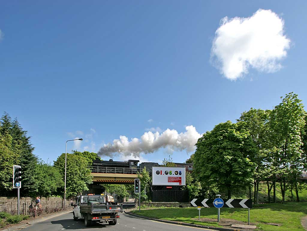 A Scottish Railway Preservation Society steam train excursion around the Edinburgh South Suburban Line and Fife Circle line crosses the roundabout at Cameron Toll, Edinburgh  -  May18, 2008