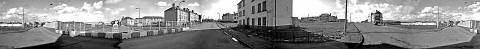 Monochrome panoramic view of Craigmillar from Niddrie Mains Drive - as the building of the new school commences