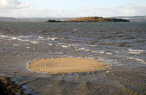 Cramond Island and san at Silverknowes about to be covered by the incoming tide