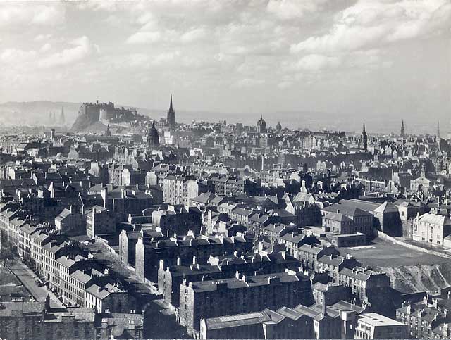 Looking down on Dumbiedykes and out towards Edinburgh Castle from Salisbury Crags - probably around the 1950s.