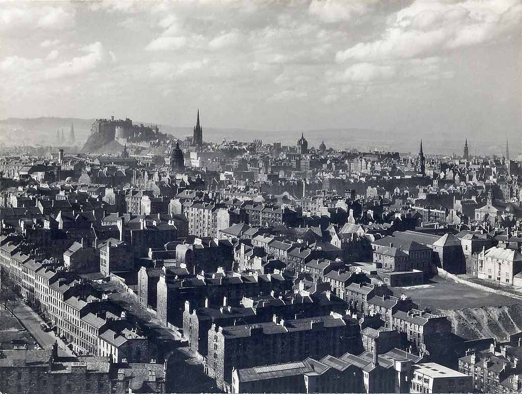 Looking down on Dumbiedykes and out towards Edinburgh Castle from Salisbury Crags - probably around the 1950s.