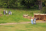 A scene from 'The Life of Jesus Christ' - a play presented at Dundas Castle  -  Mary, Joseph and Jesus outside the stable, with shepherds on the hill