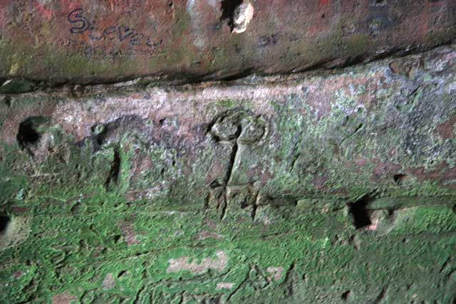Rock art carvings at Jonathan's Cave, East Wemyss, Fife  - trident