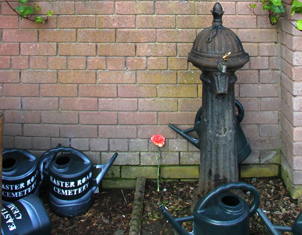 Eastern Cemetery  -  Watering Cans in the corner of the Cemetery