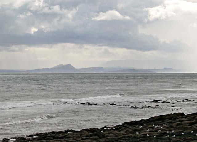Looking towards Edinburgh from East Wemyss as a storm passes over the Forth  -  zoom-in