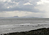 Looking towards Edinburgh from East Wemyss as a storm passes over the Forth  -  zoom-in