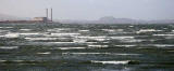 View from Longniddry, looking towards Cockenzie Power Station and Arthur's Seat in Holyrood Park, Edinburgh