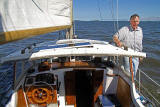 Archie Gray sailing his yacht, 'Grayling' on the Firth of Forth between Queensferry and Inchcolm