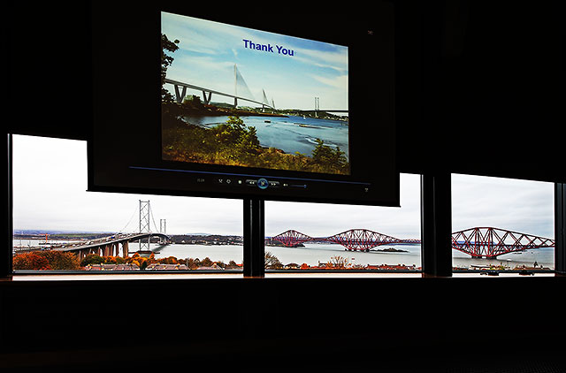 The two existing bridges across the Firth of Forth at Queensferry and (on the screen) an artist's impression of the third bridge there, 'The Queensferry Crossing', due to open in 2016.