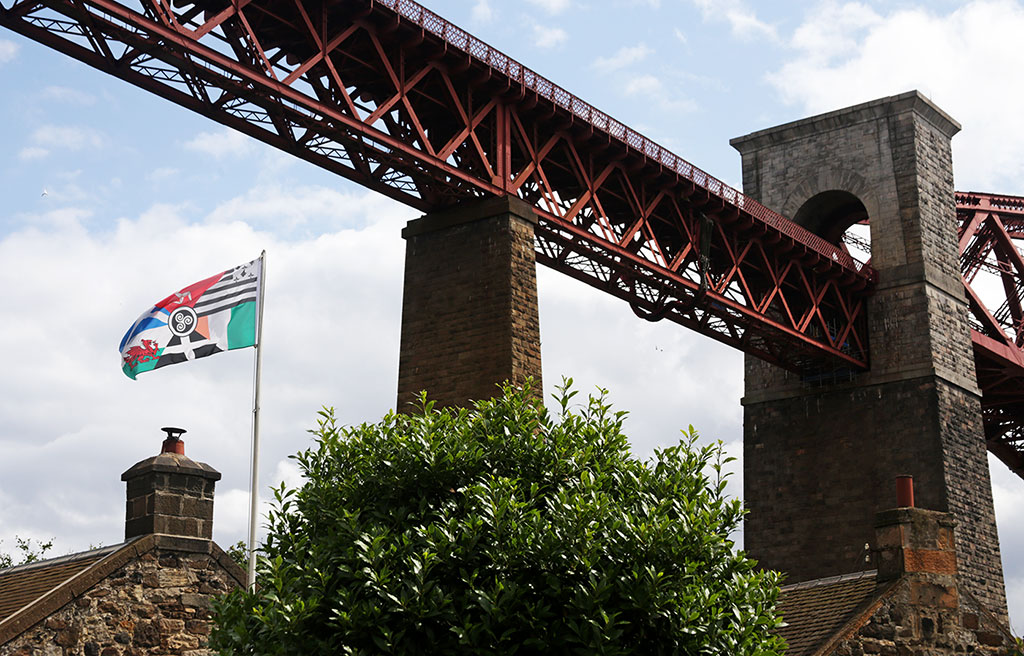 The Forth Bridge and Flag  -  North Queensferry