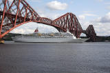 Crruise Liner, 'Black Watch' passes under the Forth Bridge on her way to dock at Rosyth