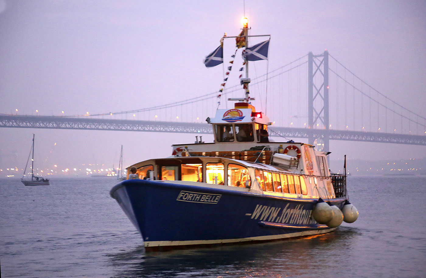 Forth Road Bridge 50th Anniversary Celebrations, September 2014  -  The cruise boat, 'Forth Belle' and its passengers departs from Hawes Pier, South Queensferry on a cruise to view the Forth Road Bridge Firework Display