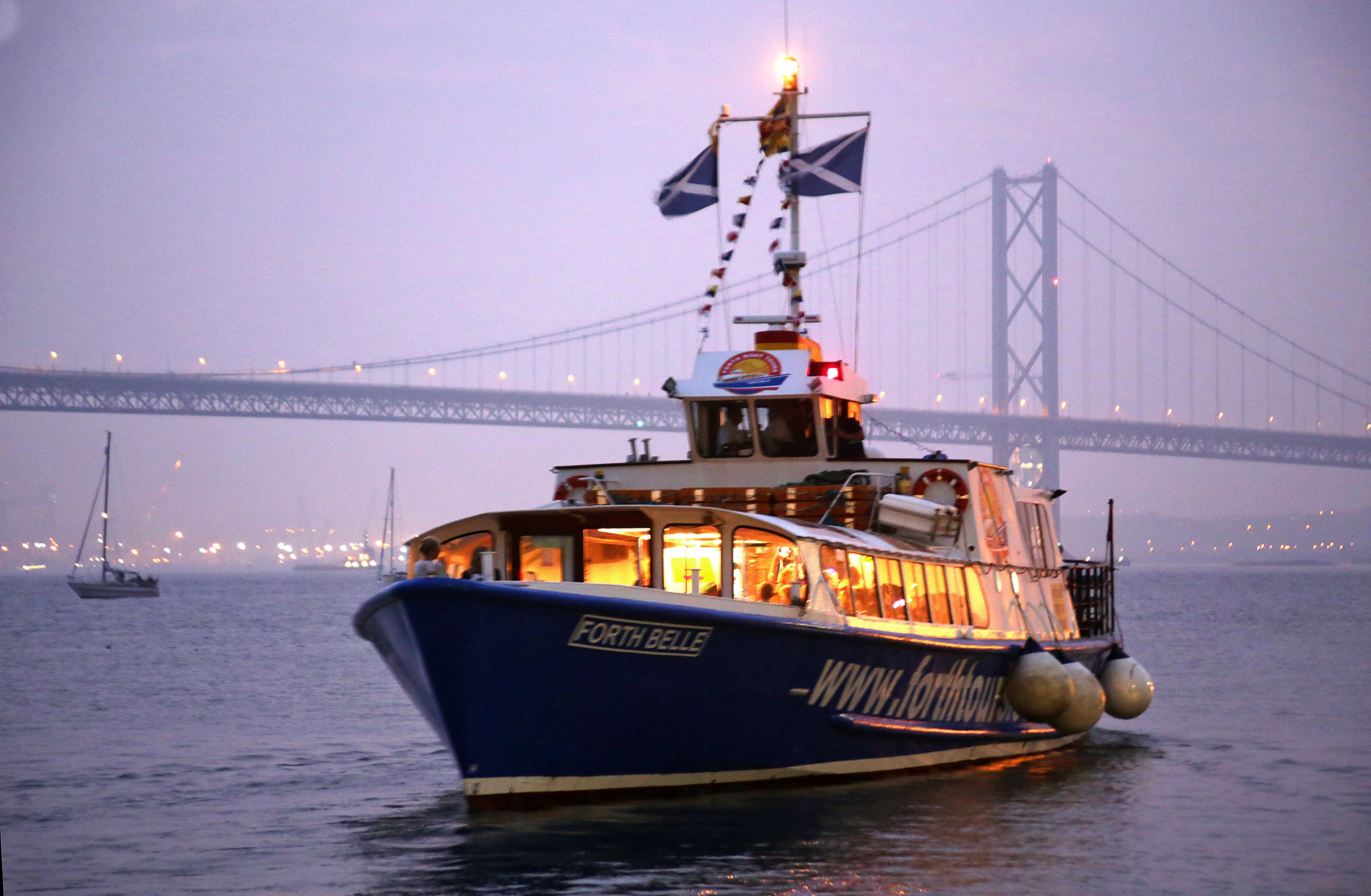 Forth Road Bridge 50th Anniversary Celebrations, September 2014  -  The cruise boat, 'Forth Belle' and its passengers departs from Hawes Pier, South Queensferry on a cruise to view the Forth Road Bridge Firework Display
