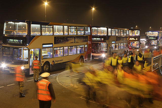 Forth Road Bridge 50th Anniversary Celebrations, September 2014  - After walking across the Forth Bridge to Fife, caarrying thieir torches, the torch bearers are brought back to South Queeensferry in a fleet of buses.