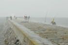 Fishing for mackerel from Granton Eastern Breakwater during a summer storm  -  July 9, 2006