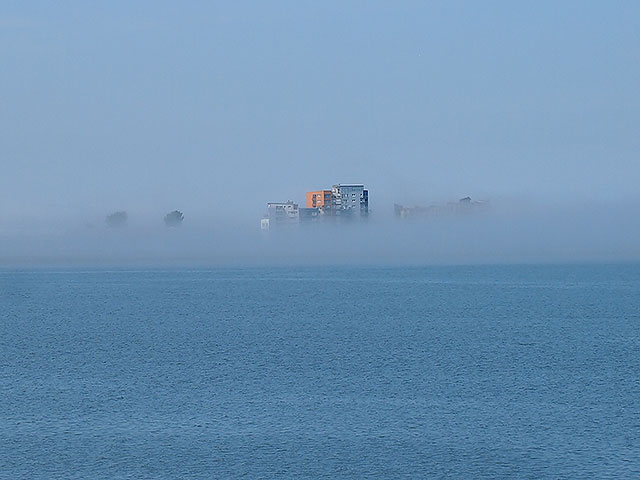 Photo of Granton through the haar, taken from Newhaven, July 2013