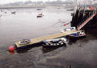 Looking over Granton Eastern Harbour from Middle Pier at low tide on a misty day