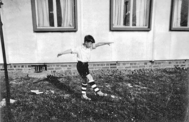 Photograph taken outside one of the pre-fab houses at Greendykes, around 1957