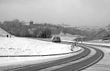 Looking down Queen's Drive in Holyrood Park towards Dumbiedykes  -  January 2008