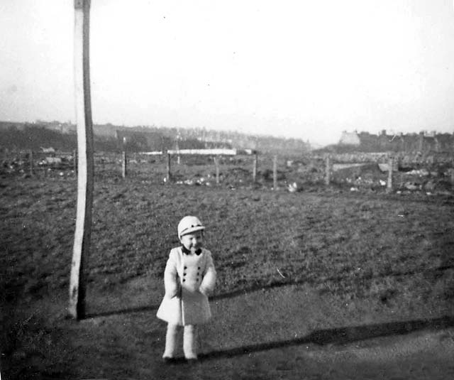 Alex Jackson in Holyrood Park, 1950s - Allotments in the background