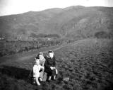 Alex Jackson family in Holyrood Park, 1950s - Allotments in the background