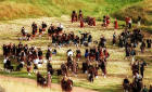 Pipers gather in Hunter's Bog on Arthur's Seat in Queen's Park, Edinburgh, before joining in the ceremony of "Beating the Retreat" on 17 August 2003