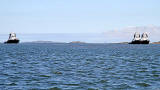 The tanker 'Delta Captaion' takes oil on board at Hound Point Terminal