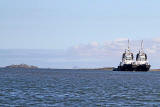 Tugs beside Hound Point terminal