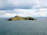 The Island of Inchkeith near Leith in the Firth of Forth, photographed  from a ferry, May 2008