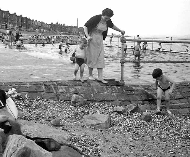 Forbes Wilson and his mother at Joppa Paddling Pool, around 1960