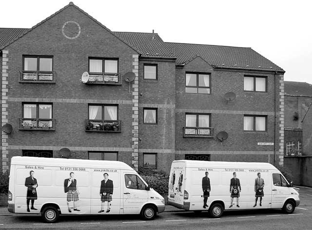 Two vans parked beside the promenade in Kirkcaldy