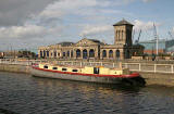 View, looking along Alexandra Dock beside the old swing bridge in Leith Harbour, towards Ocean Terminal shopping centre and cinema complex.